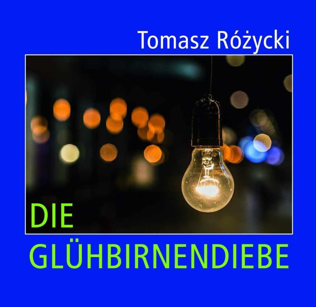 Buchcover "Die Glühbirnendiebe" mit einem Bild erin Glühbirne, die von der Decke hängt mit verschwommenen Glitzerlichtern im Hintergrund.